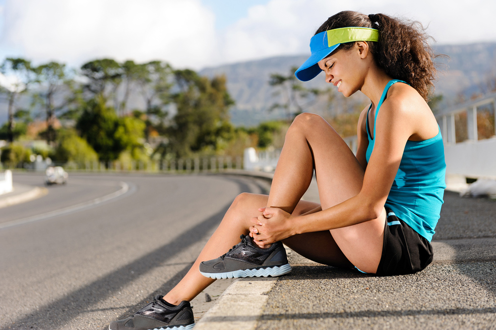 Woman with shin splints needs chiropractic care.