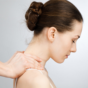 woman having neck adjusted