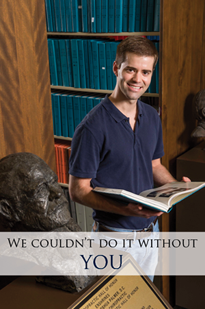 man with book at chiropractic college in Texas