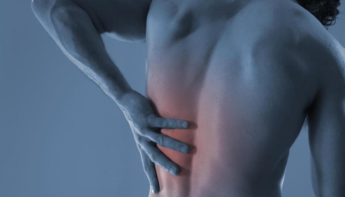 Man with back pain in Broomfield, CO