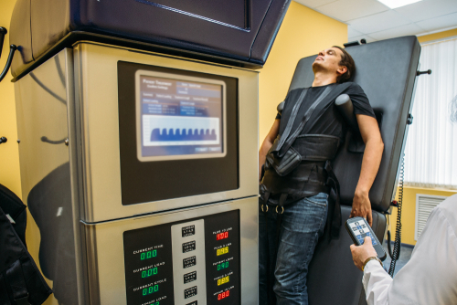 Man receiving spinal decompression therapy at chiropractic clinic in Jacksonville Beach, FL