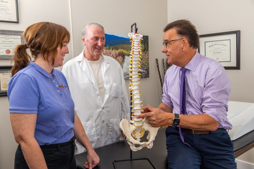 doctor showing spine