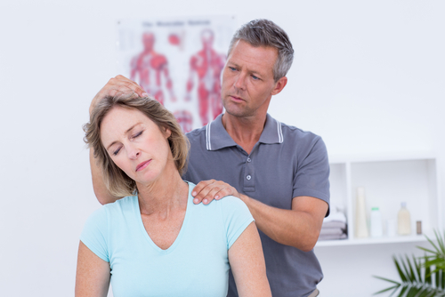 Robbinsville, NJ chiropractor treating client for chronic neck pain.